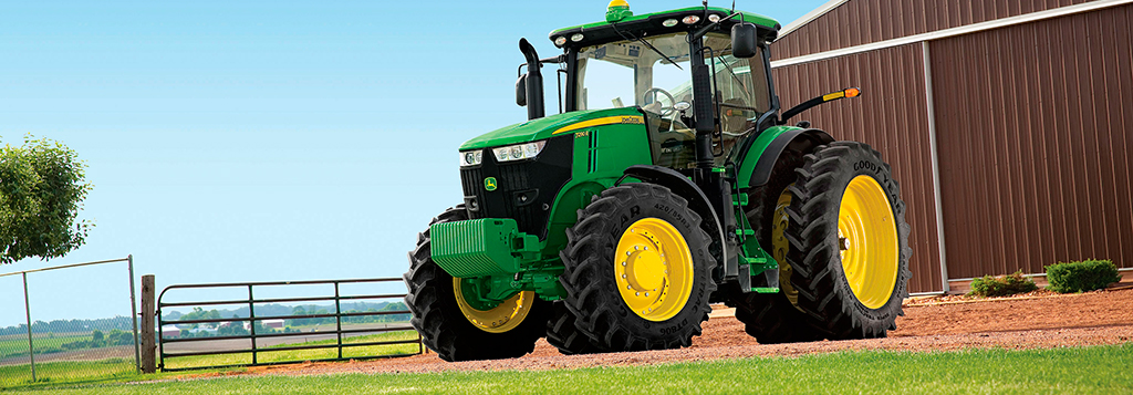 Illustrasjon av John Deere-traktor med aircondition.